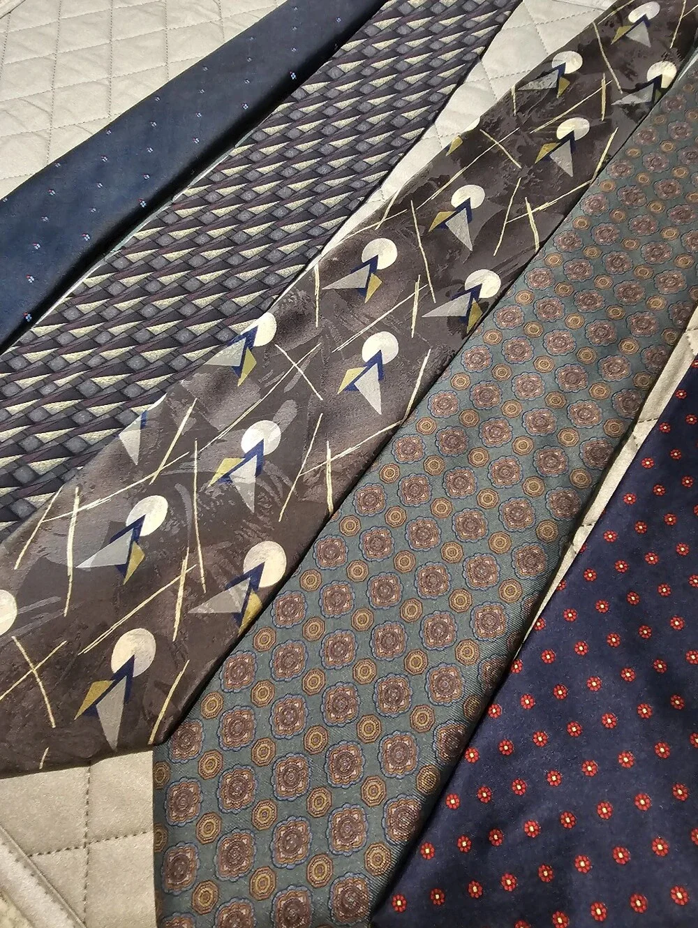 Vintage Men's Assorted Patterned Ties in Navy, Gray, and Blue